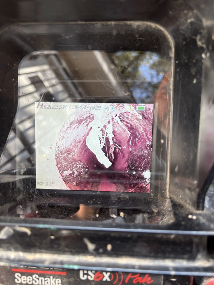 Sewer inspection camera display showing inside a drain line